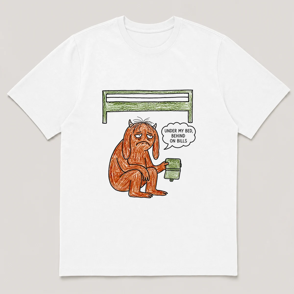 Front view of a White Tee printed with droopy monster under a bed holds an empty wallet upside down and the caption UNDER MY BED, BEHIND ON BILLS, White front view