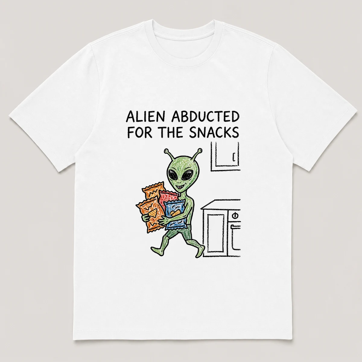Front view of a White Tee printed with small alien tiptoes out of a kitchen carrying an armful of chip bags and the caption ALIEN ABDUCTED FOR THE SNACKS, White front view