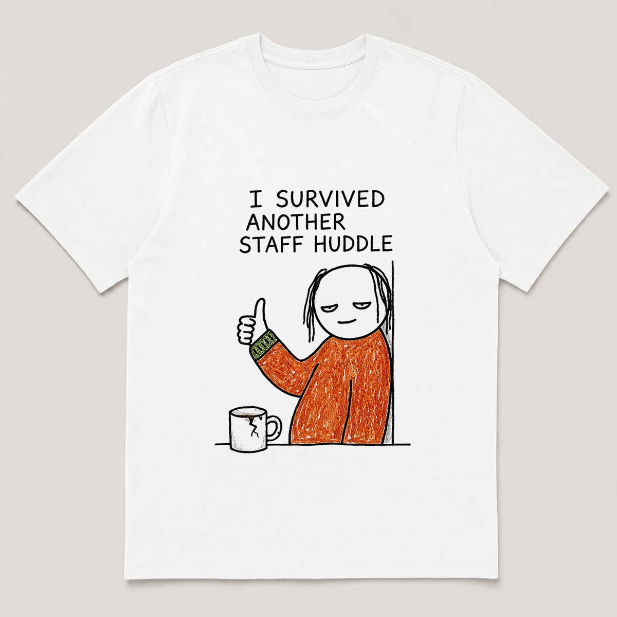 Front view of a White Tee printed with a drained guy leans against a wall giving a wobbly thumbs up with a cracked coffee mug nearby and the caption I SURVIVED ANOTHER STAFF HUDDLE, White front view
